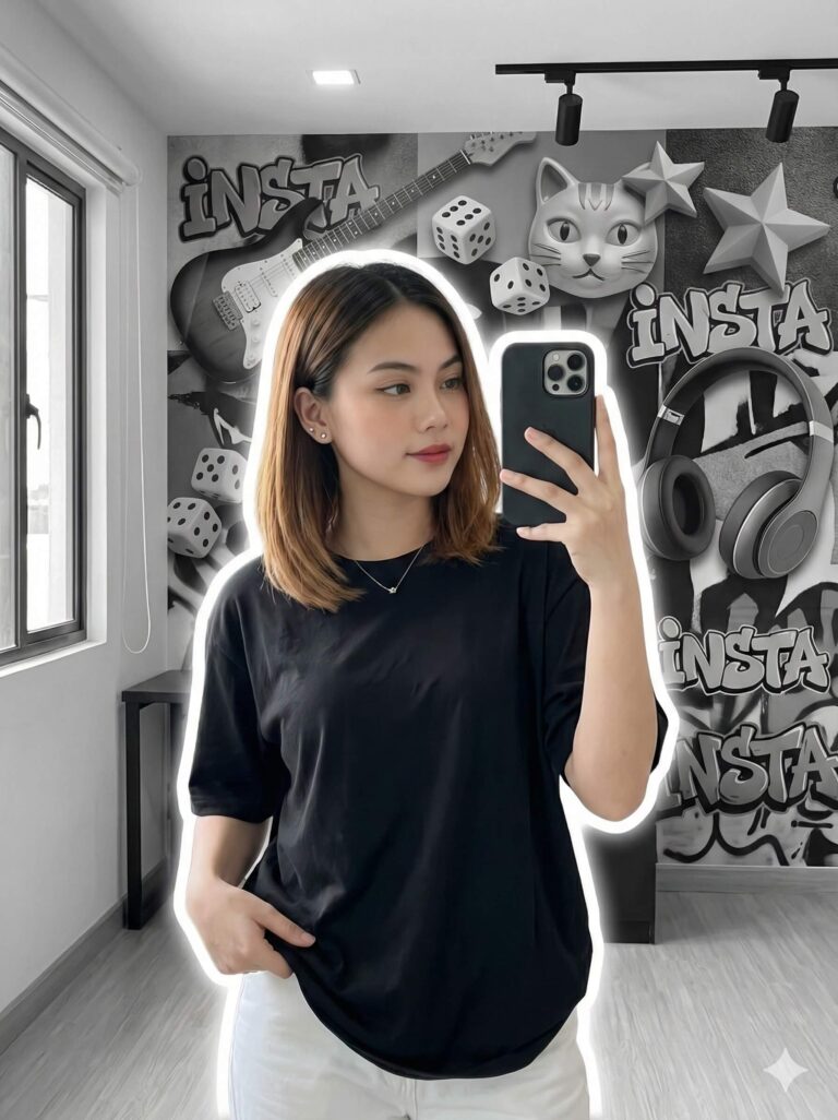 Gemini Generated Image: A young woman with shoulder-length brown hair is taking a mirror selfie. She is wearing a black t-shirt and white pants. The background is a black and white graffiti-style wall featuring images of a guitar, dice, a cat, and headphones. There is a glowing white outline around her figure.