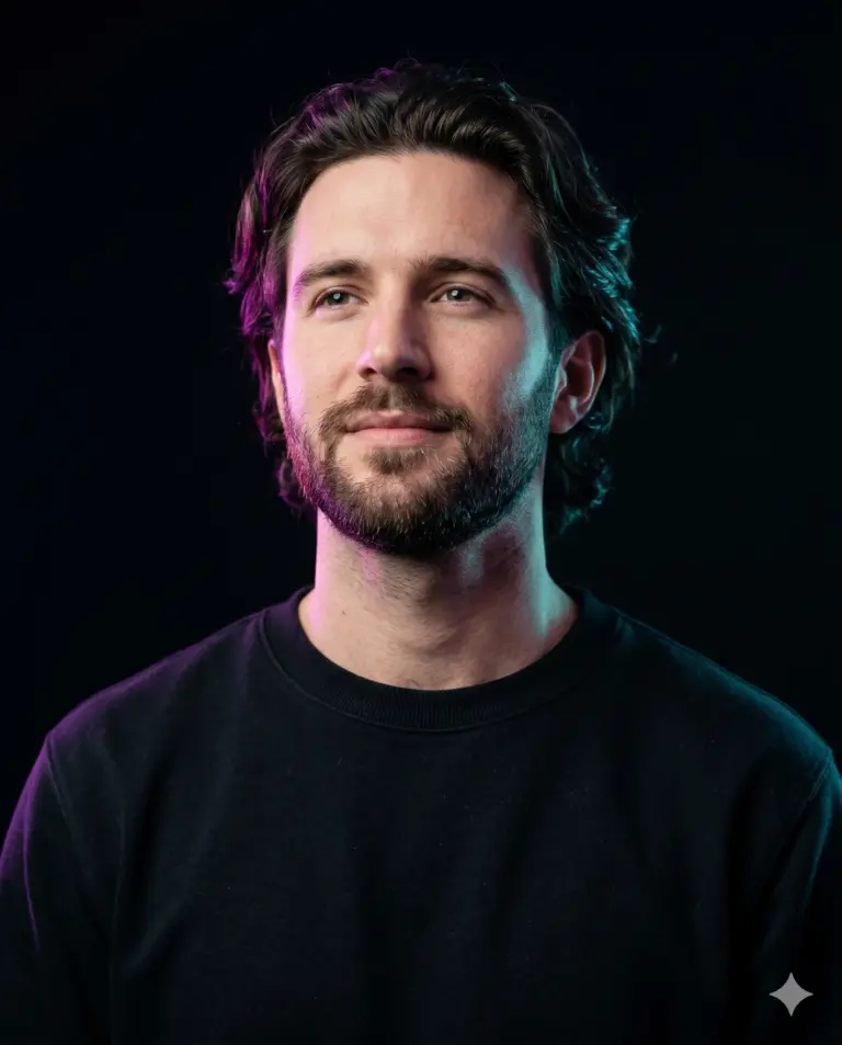 Neon Lit Man AI Photo Editing Prompt. AI generated studio portrait of a bearded man illuminated by pink and cyan rim lighting against a dark background.